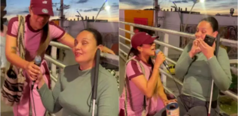 Karen Lizarazo canta con mujer con discapacidad visual en puente de Floridablanca