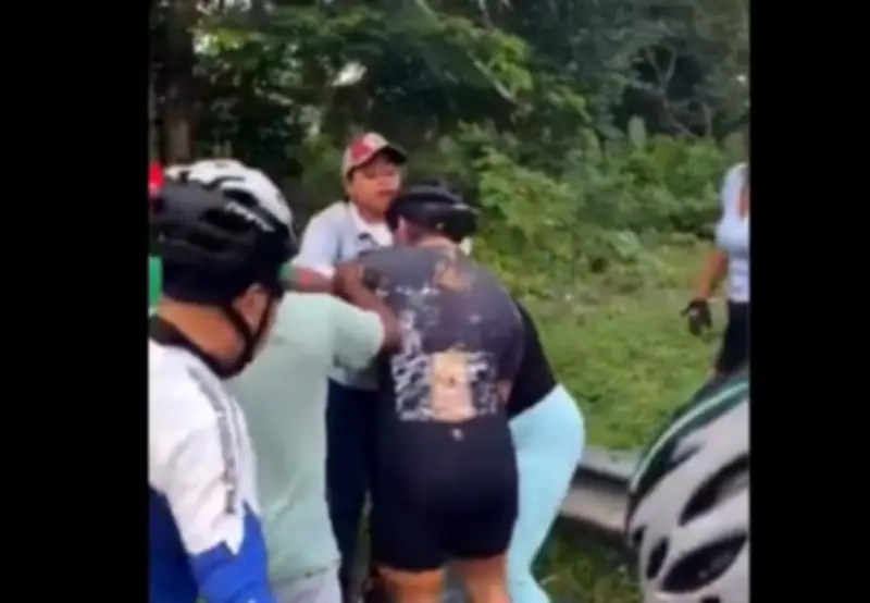 Pelea viral en Colombia: Mujer sorprende a su esposo en bicicleta con supuesta amante y se desata violencia