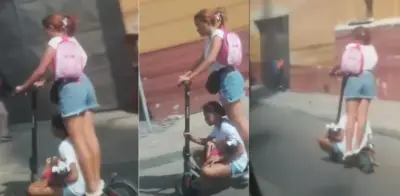 Indignación en Barranquilla por mujer que transporta a dos niños en patineta eléctrica en calle 30