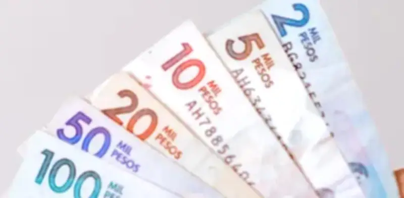 Fiscalidad salarial en la OCDE sube en 2025, Colombia destaca con cuña del 0%