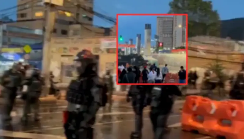 Encapuchados y UNDMO se enfrentan en Bogotá; usan tanqueta para desbloquear
