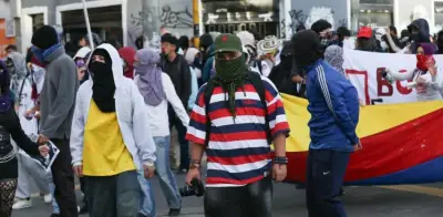 Encapuchados generan disturbios en Bogotá tras protesta por tarifa diferencial en TransMilenio