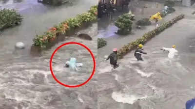 Niño arrastrado por corriente en China es rescatado por repartidores