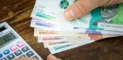 Colombianos reducen carga financiera pese a altas tasas de interés