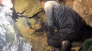 Continúa búsqueda de dos desaparecidos en cueva de Laos